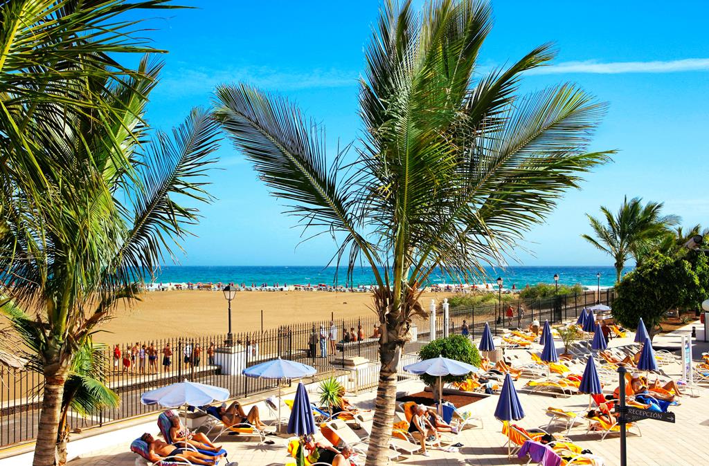 Las Costas – Zonneterras met palmen, Puerto del Carmen