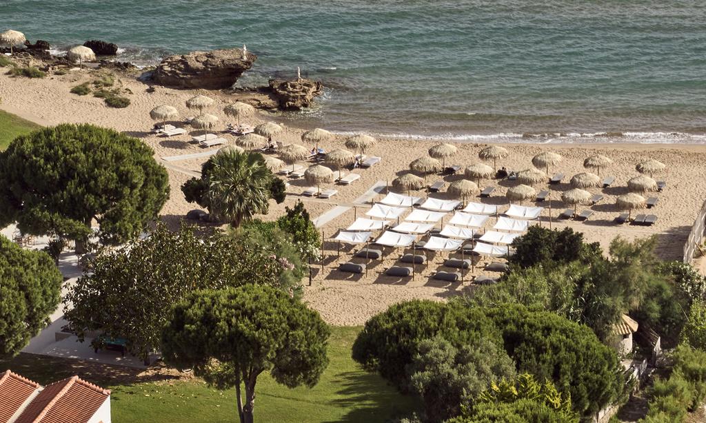 The Bay – Strand met parasols, Vassilikos