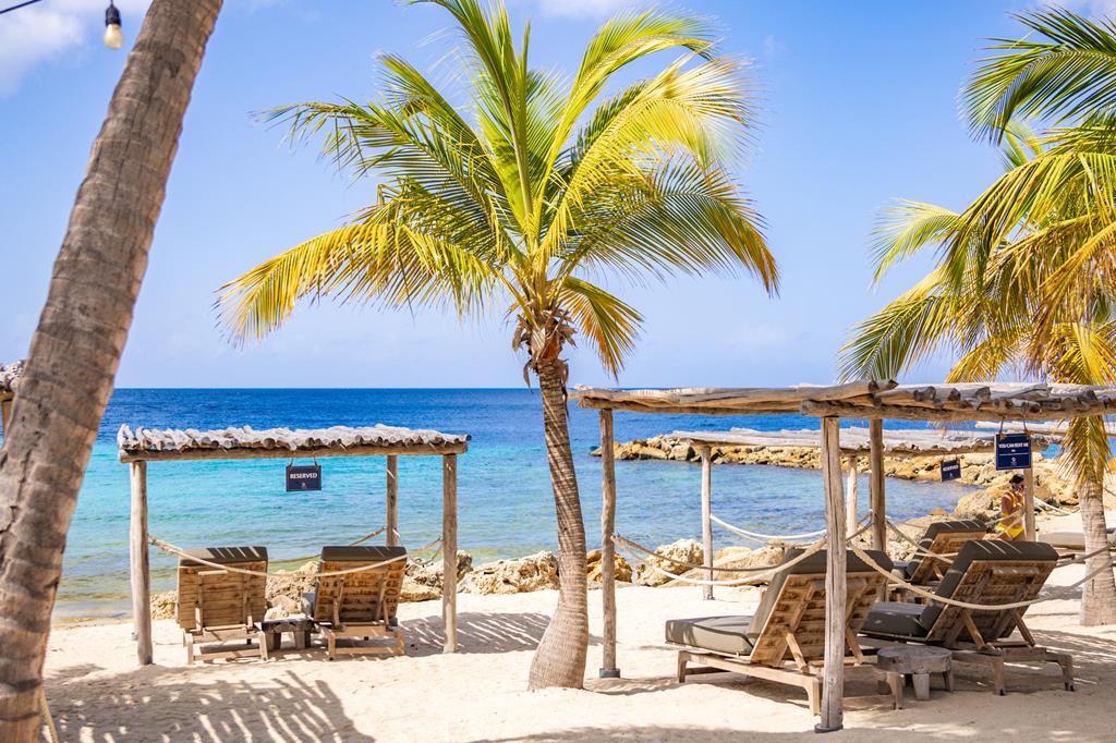 Bayside Boutique Blue Bay Golf & Beach Resort – Strand met palmen, Blauw Baai