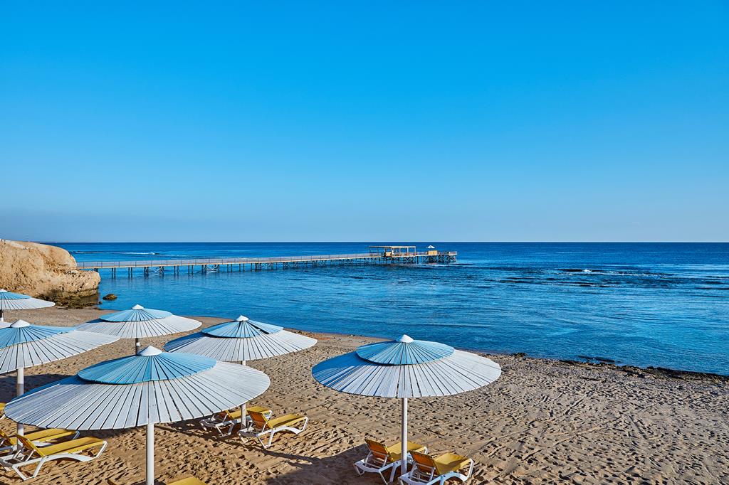Jaz Grand Marsa – Strand met parasols, Coraya Bay