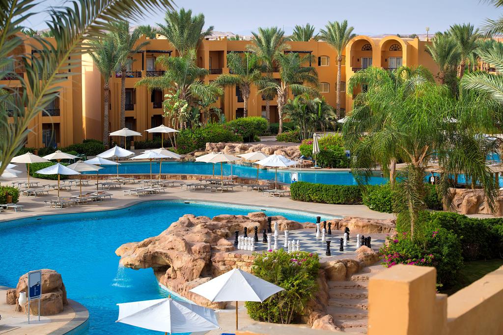 Stella Makadi Beach Resort & Spa – Zwembad met parasols, Makadi Bay