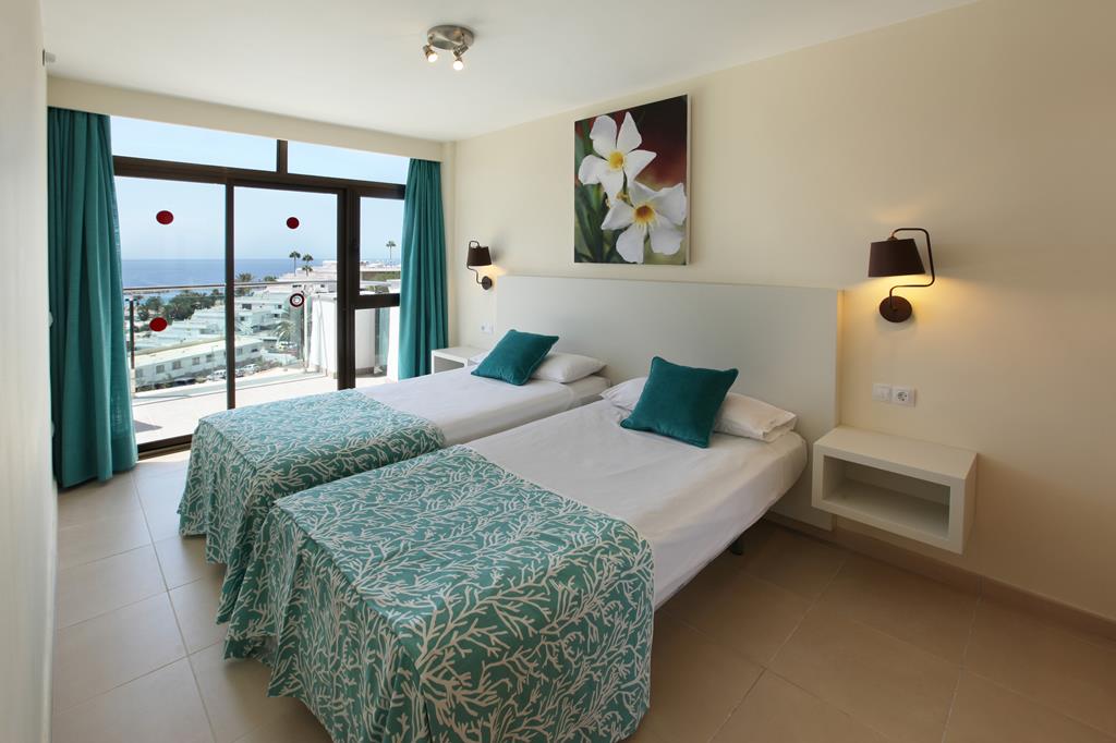 Revoli Playa – Kamer, Puerto Rico