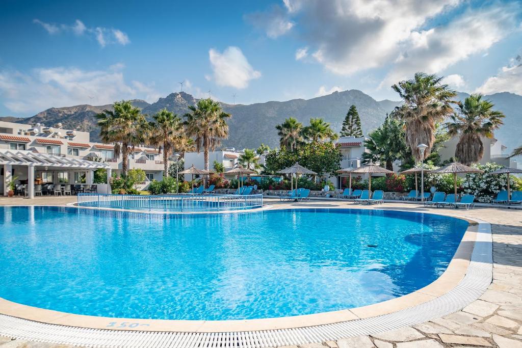 Evripides Village – Zwembad met palmen en bergen, Kardamena