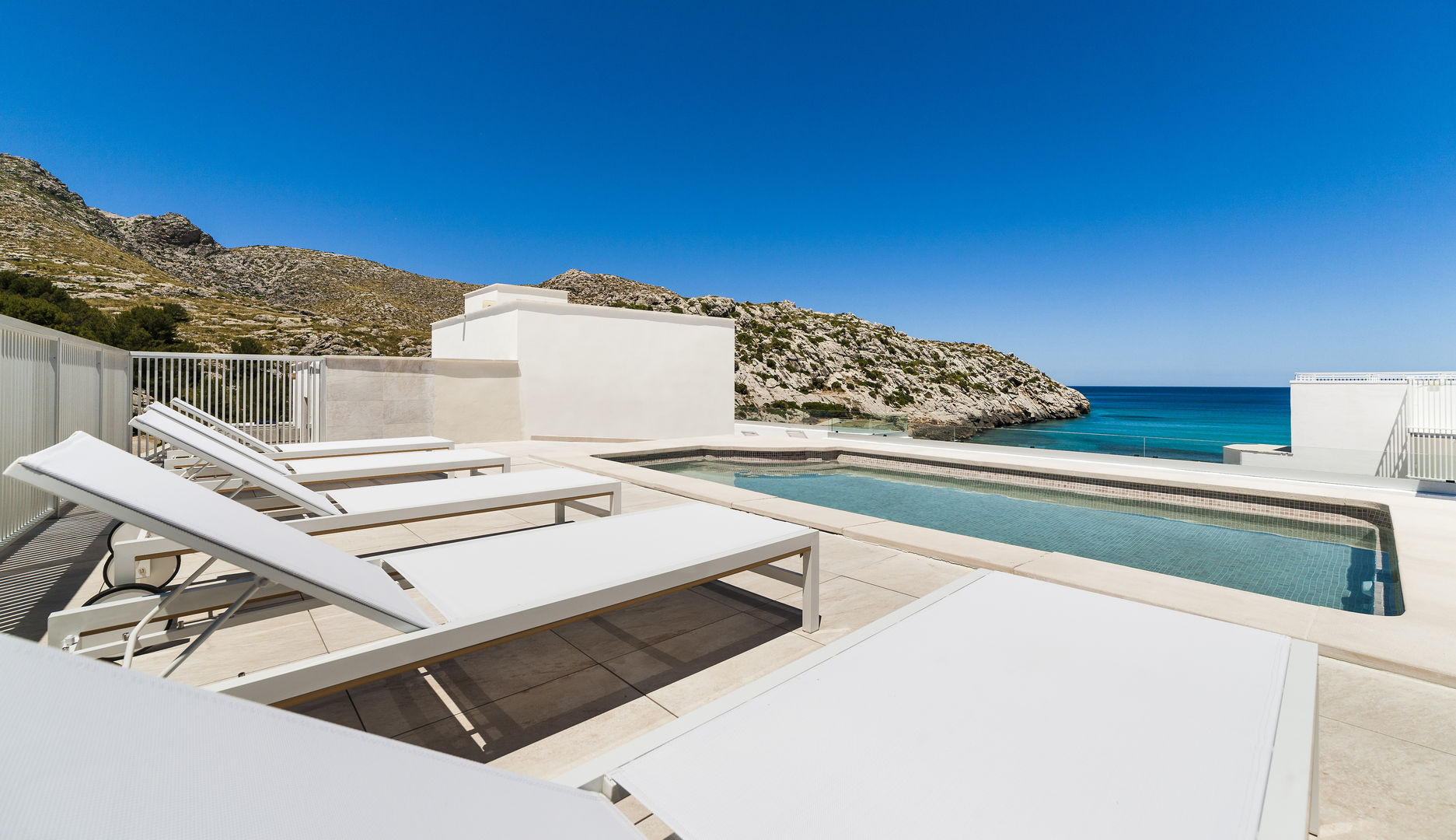 Hotel Hoposa Niu – Dakterras met baai, Cala San Vicente