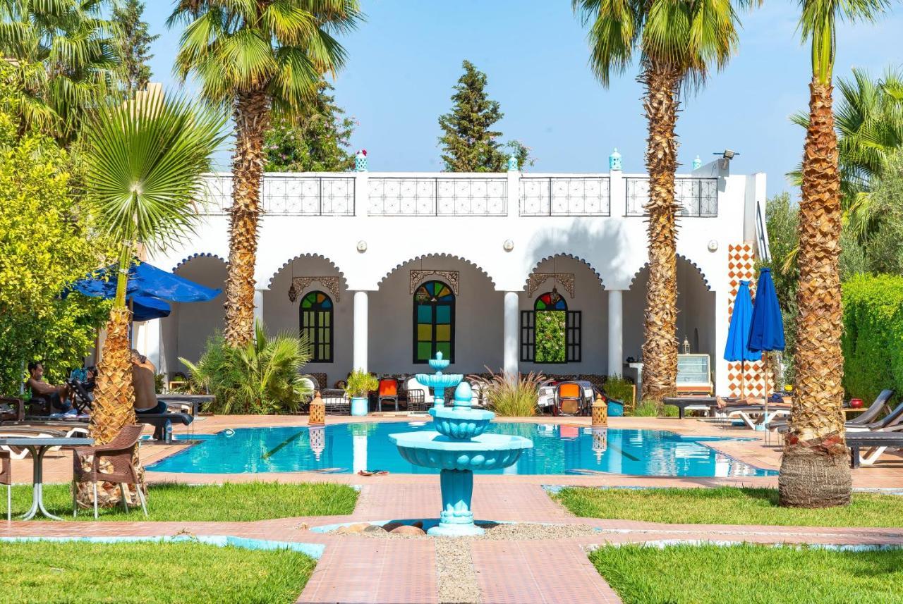 Riad Qodwa – Zwembad met palmen, Marrakech