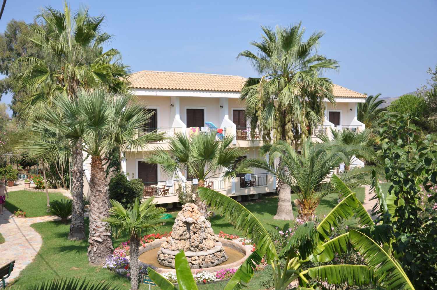 Ilios Hotel – Tuin met palmen, Laganas
