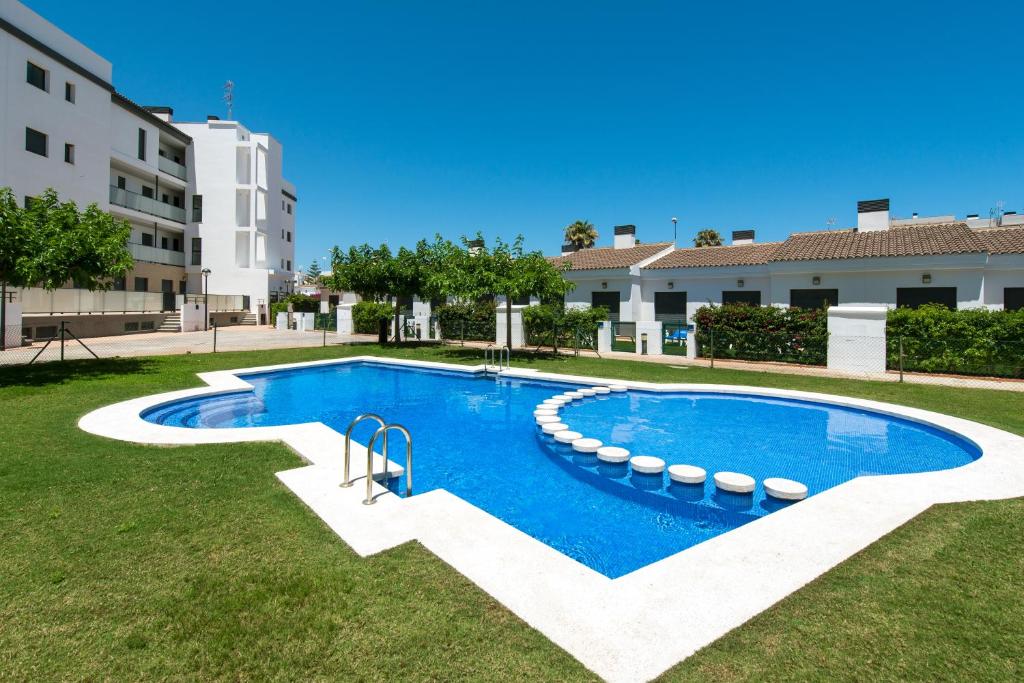 Residencial Las Dunas – Zwembad in de tuin, Oliva