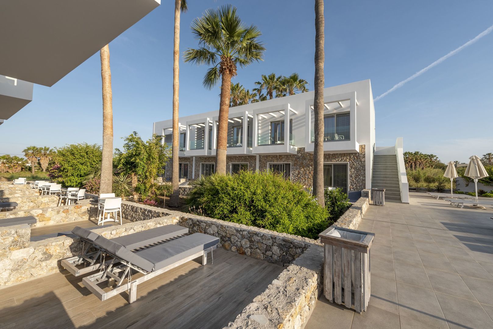 Apollon Windmill Hotel – Terras met ligbed, Lambi