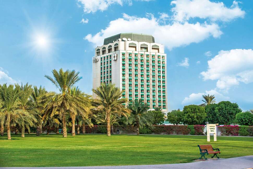 Holiday International Hotel Sharjah cover