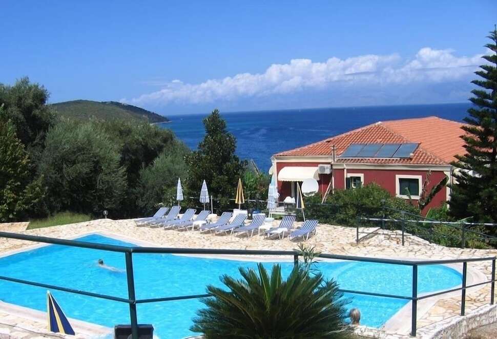 Apraos Bay Hotel cover