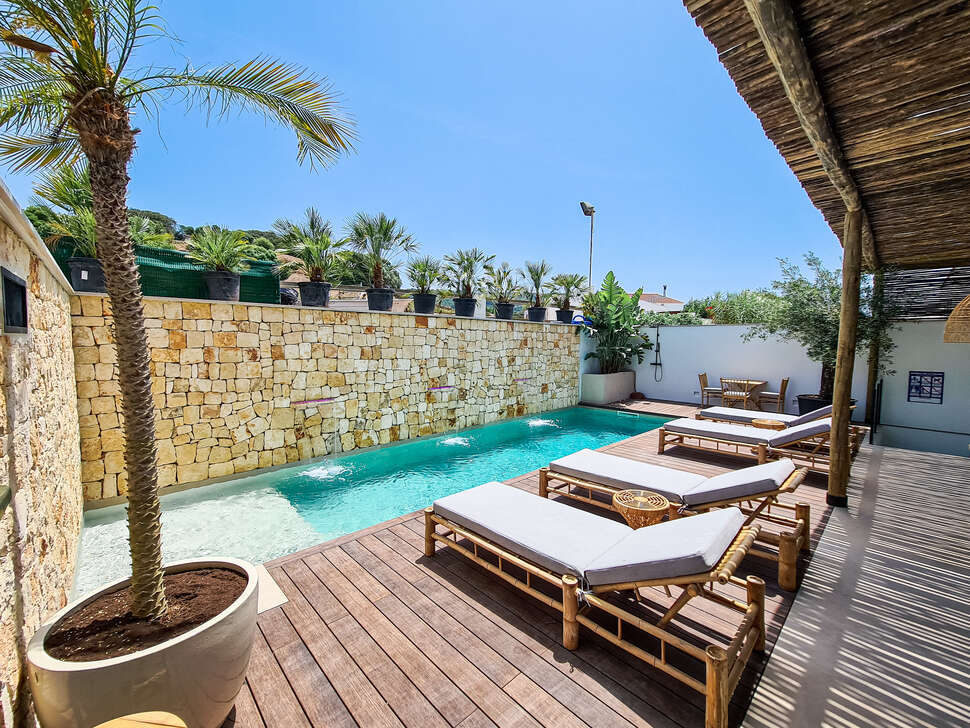 S'estancia Suites cover