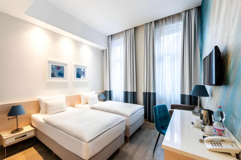 Atrium Hotel by Mellow Mood Hotels cover